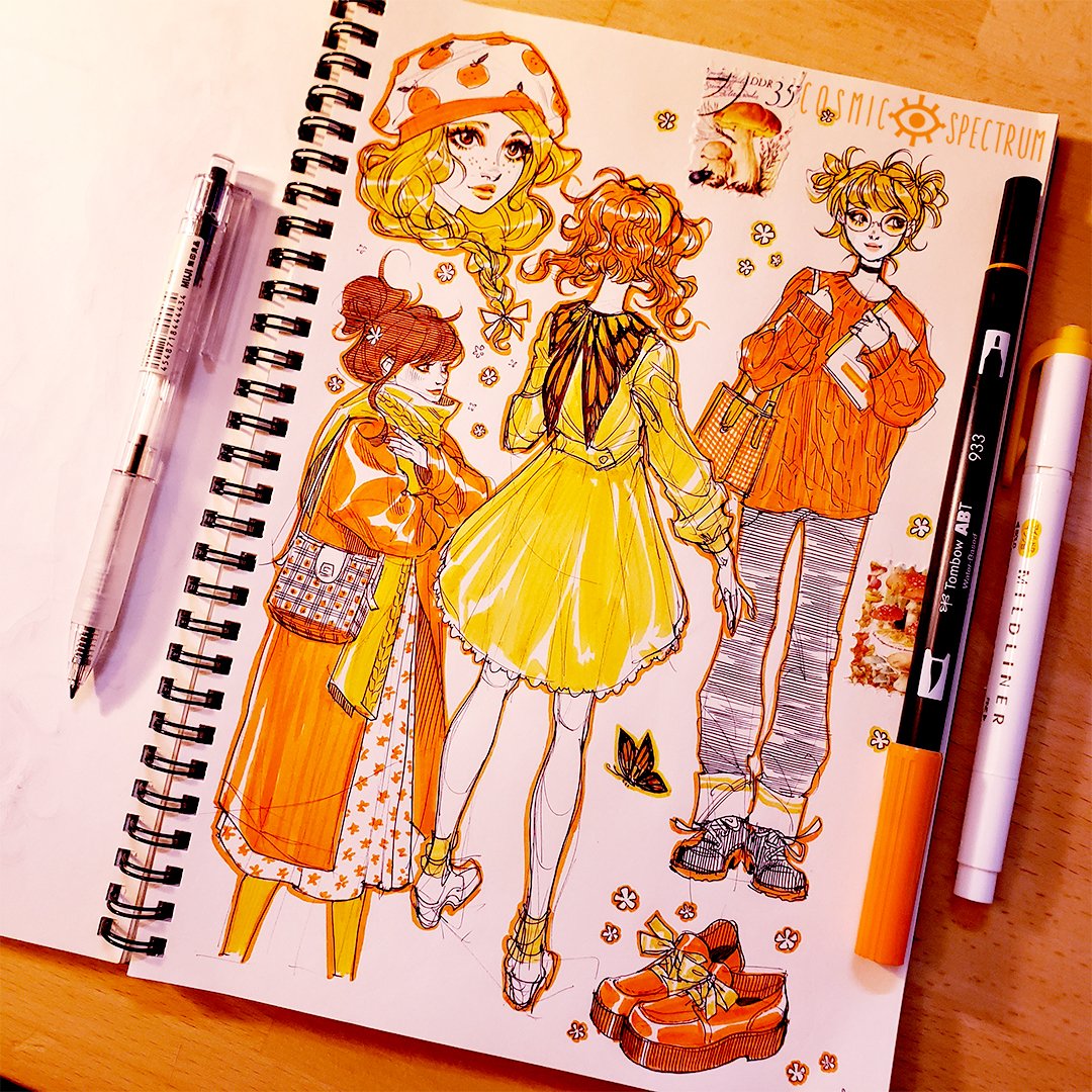 the image shows a sketchbook filled with vibrant, colorful illustrations of young women drawn in a mangainfluenced style.  the overall color scheme is a mix of oranges and yellows. several female characters are sketched with different outfits and hairstyles. various accessories like hats, bags, and shoes are also depicted. the artwork is done using markers, likely copic markers judging by the visible brand marker on the page.  the style is lighthearted and fashionable, with attention to detail in the clothing and accessories.  small doodles and design elements like flowers and butterflies are incorporated into the background. the page also includes the hashtag #cosmicspectrum. the artist’s tools—a tombow dual brush pen and a white fine liner—are visible on the page.