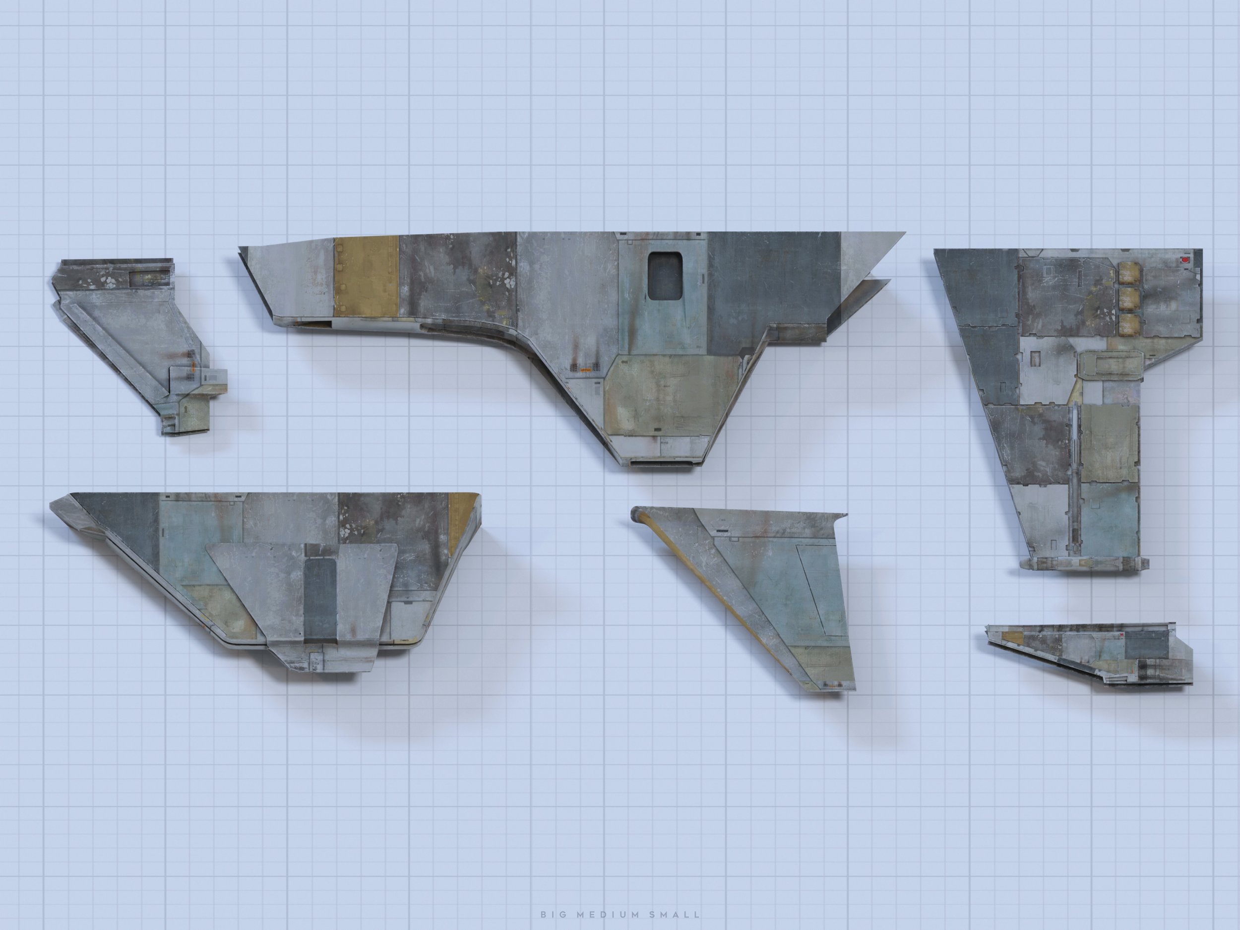 an overhead, topdown view of a disassembled spaceship model laid out on a gridded background. the parts are various shapes and sizes and exhibit a weathered, metallic appearance with various shades of grey, blue and yellow. the image looks like a blueprint or design schematic for the spaceship.  the parts suggest different sections of the spacecraft, from wings to body components.  a small caption at the bottom reads "big medium small," possibly referring to the relative size of the components.