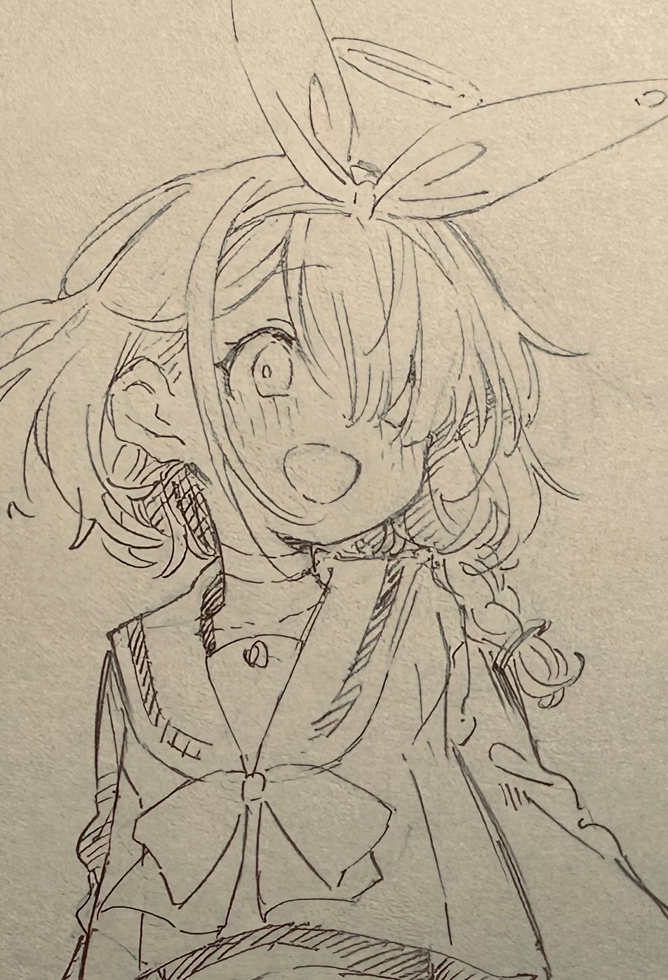 a closeup sketch of an animestyle girl with bunny ears on her head. she is wearing a sailorstyle school uniform with a bow tie. her hair is styled in a braid that falls down her back. she has a surprised and happy expression on her face. the sketch is done in pencil or pen, in a grayscale style.