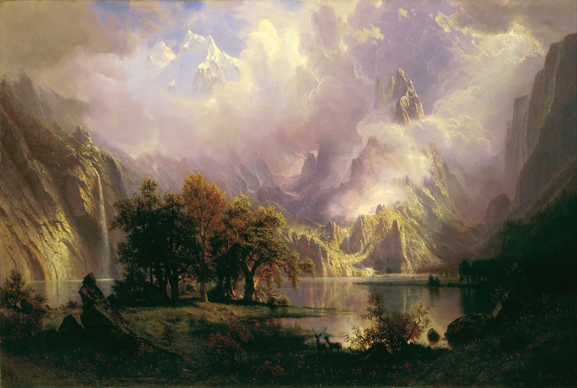 the image is a painting depicting a grand, mountainous landscape with a serene lake in the foreground. a waterfall cascades down a steep cliff on the left side of the painting. in the foreground, there are trees with autumnal hues, and a couple of deer are visible near the water's edge. the sky is filled with dramatic clouds that envelop the mountain peaks, creating a sense of atmospheric perspective. the lighting is soft and golden, enhancing the majestic and peaceful ambiance of the scene. the painting style is reminiscent of 19thcentury landscape art, possibly by albert bierstadt.