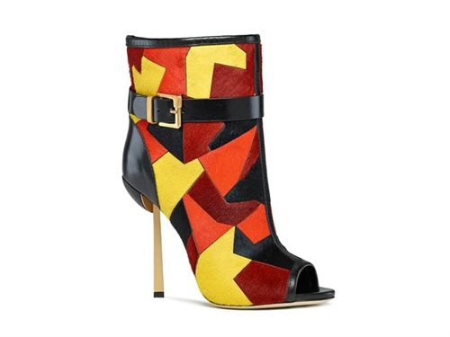 a pair of women's high heel ankle boots with peep toes. the boots are made of leather and suede in a colorful geometric pattern. the heel is a stiletto and is a gold color. the boots are a designer style and are elegant and stylish.