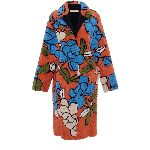 a long floral coat with a burnt orange base and blue and white flowers. the coat has a black collar. the coat is perfect for the fall or winter season. it is a stylish and chic piece that is sure to turn heads.