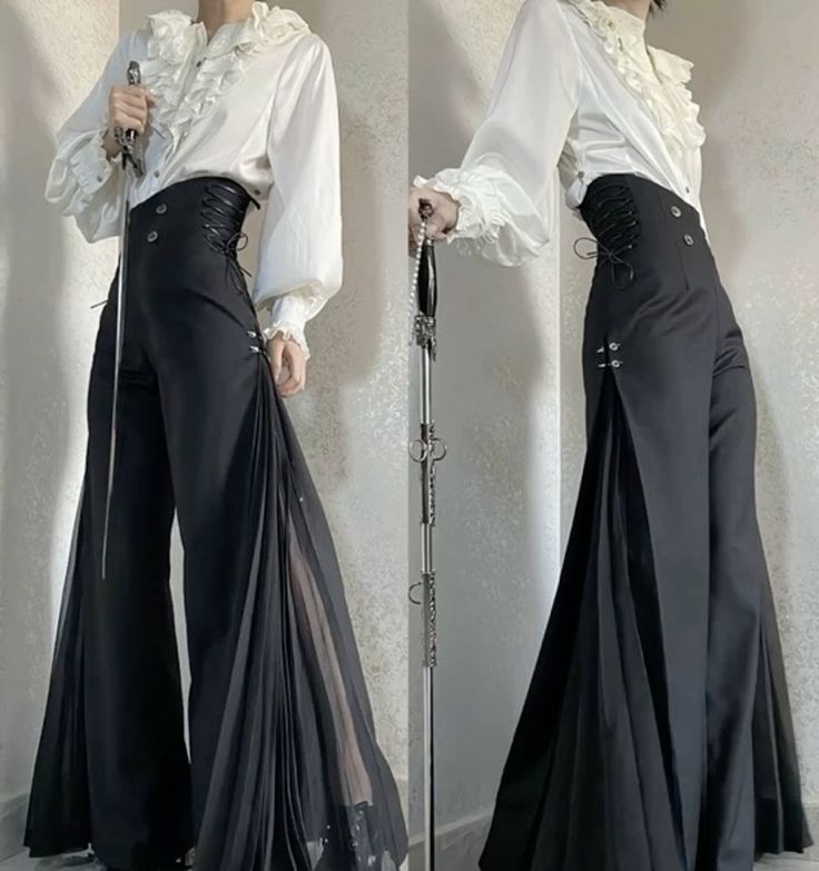 the image shows a person wearing a victoriangothic inspired outfit. the person is wearing a white blouse with a ruffled collar and long, puffy sleeves. the person is also wearing highwaisted black pants with corset detailing on the sides and wide legs with pleated and sheer fabric. the person is holding a sword in one hand and a cane in the other.
