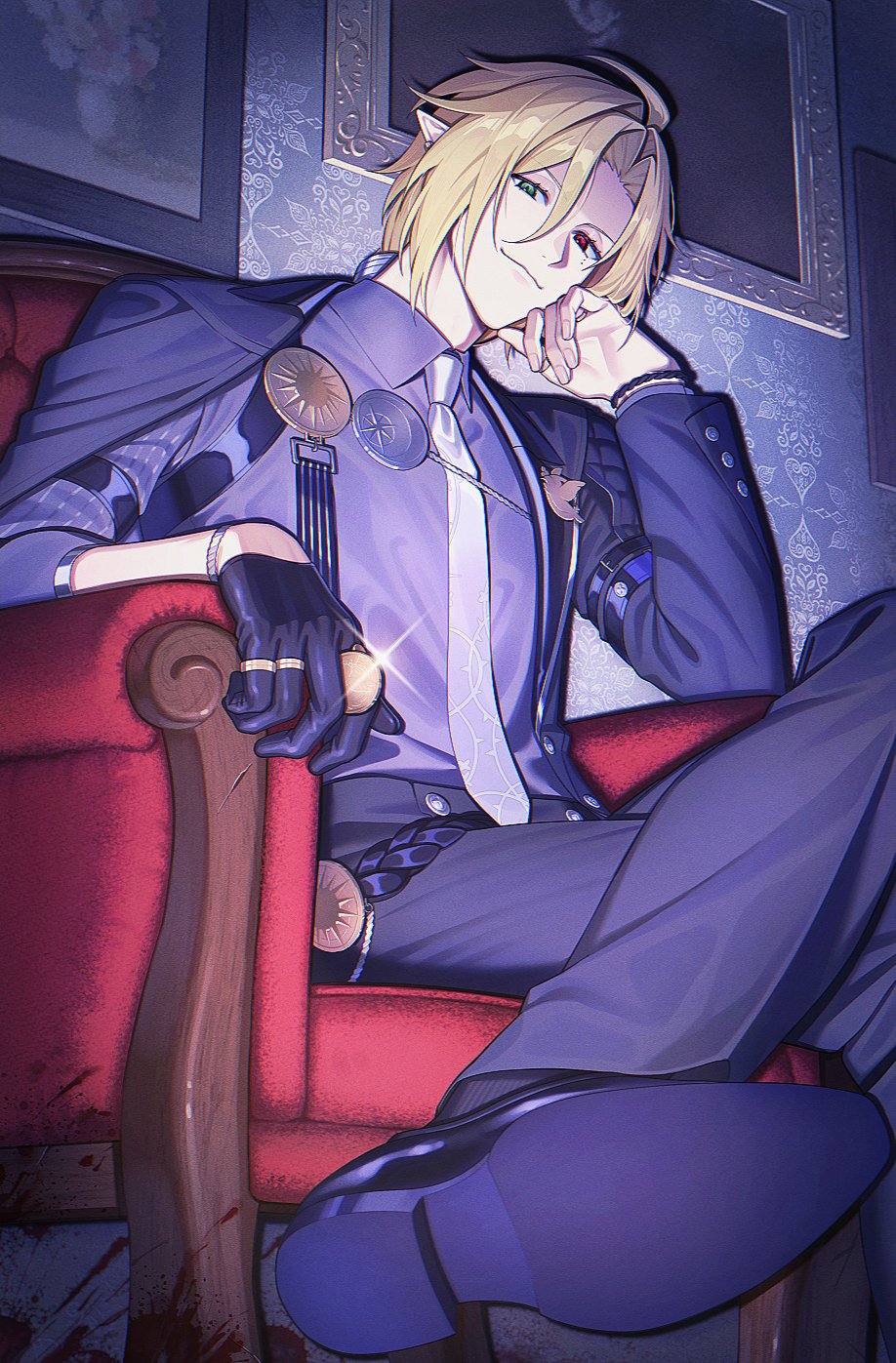 a full shot of a man sitting in an armchair. he has blonde hair, fair skin, and one red eye. he's wearing a dark blue suit with a light blue shirt and white tie. he also has on black gloves and a golden ring. he has a lapel pin on his left lapel, and two large golden brooches on his right. he is resting his face on his gloved hand and smirking. the armchair is red with a wooden frame. there are paintings behind him and the wallpaper is patterned with hearts and diamonds.
