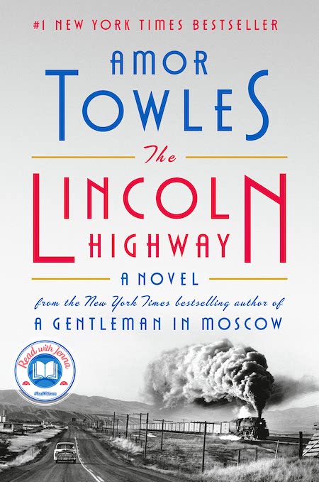 the cover of the book "the lincoln highway" by amor towles. the cover features a black and white photograph of a train chugging down a track, with smoke billowing from the engine.  a car is driving on a highway, with the words "the lincoln highway" in large, bold letters, above the word "a novel".  the title "the lincoln highway" is in red letters and is underlined.  beneath this, the cover indicates that the book is by the author "amor towles".  also below the title is the phrase "from the new york times bestselling author of a gentleman in moscow". the cover is black and white with the exception of the title and the words "amor" and "towles", which are in blue. the words "read with jenna" are at the bottom left corner of the cover, with a book logo next to it.