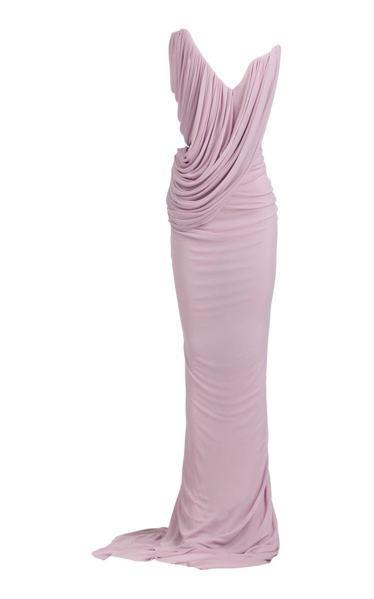 a long, pastel pink or lavender dress is showcased on a white background. the dress features an asymmetrical oneshoulder design with draped fabric across the bodice. the skirt of the dress is a formfitting sheath or column style, with a slightly elongated hem that suggests a subtle train. the overall look is elegant and formal.
