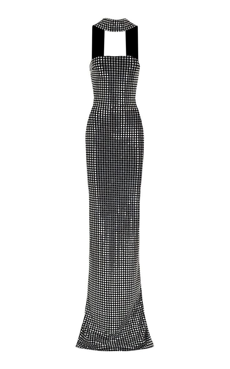 a floorlength dress with a blackandwhite squared pattern and a halterneck style.