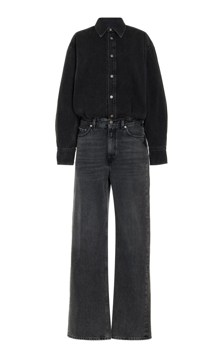 a black denim jumpsuit with a buttonup shirt top and wide legs. the jumpsuit is on a model and is shown from the front.