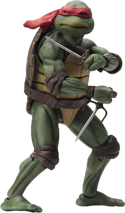a closeup shot of a teenage mutant ninja turtles action figure. the figure is dressed in the iconic red bandana and green shell of leonardo. it is holding two sais in its hands and is poised in a fighting stance.