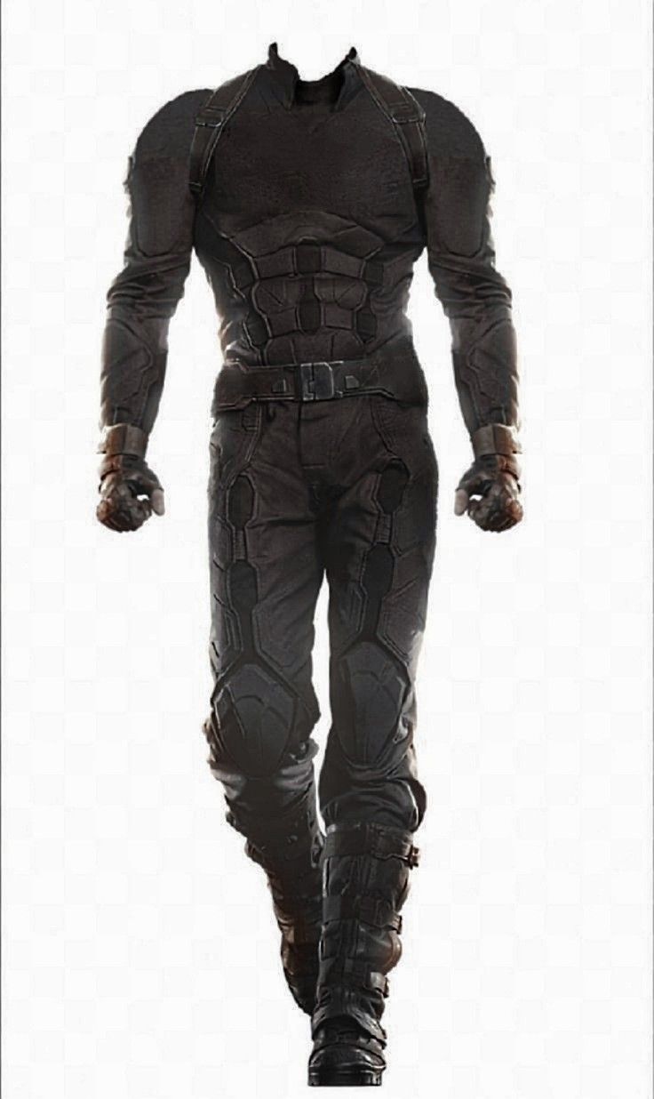 a man in a black superhero suit stands in front of a white background. he is wearing a helmet and is armed with two armmounted guns.