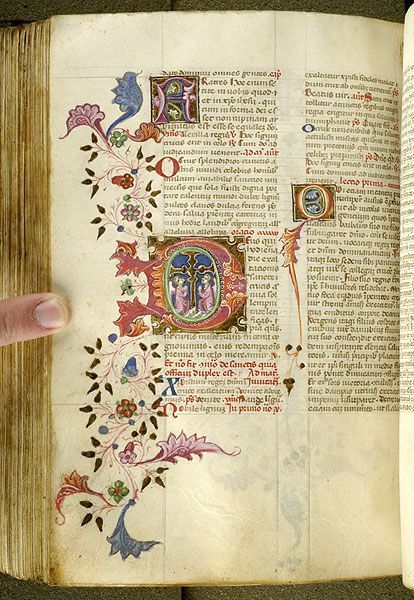 a closeup photograph of an illuminated manuscript page. the page is decorated with beautiful floral vines and an ornate capital letter 'o'. the text is written in a clear and legible hand, and the page is in good condition. the manuscript is a testament to the skill and artistry of medieval scribes. the page features a gothic script in red and black ink with decorated capital letters. there are colorful floral details and intricate ornamentation around the letter 'o' and along the edge of the page. the image captures the beauty and artistry of medieval illuminated manuscripts and offers a glimpse into the rich history of religious art.