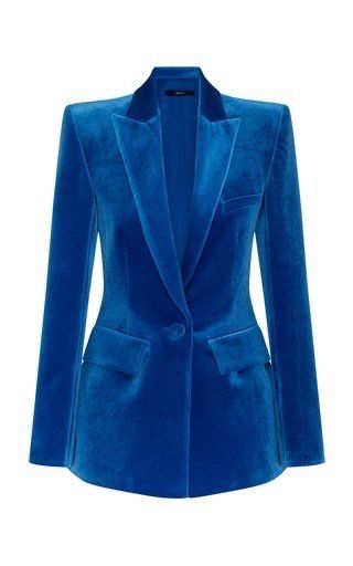 this is a photo of a blue velvet blazer. it is a women's blazer that is perfect for any occasion. it is elegant, stylish, and sophisticated. the blazer is made of highquality velvet that is soft to the touch. the blazer is a singlebreasted blazer with a notch lapel and two front pockets. the blazer has a button closure and is fully lined. the blazer is a great piece of clothing that can be dressed up or down. it is perfect for work, parties, or special occasions.