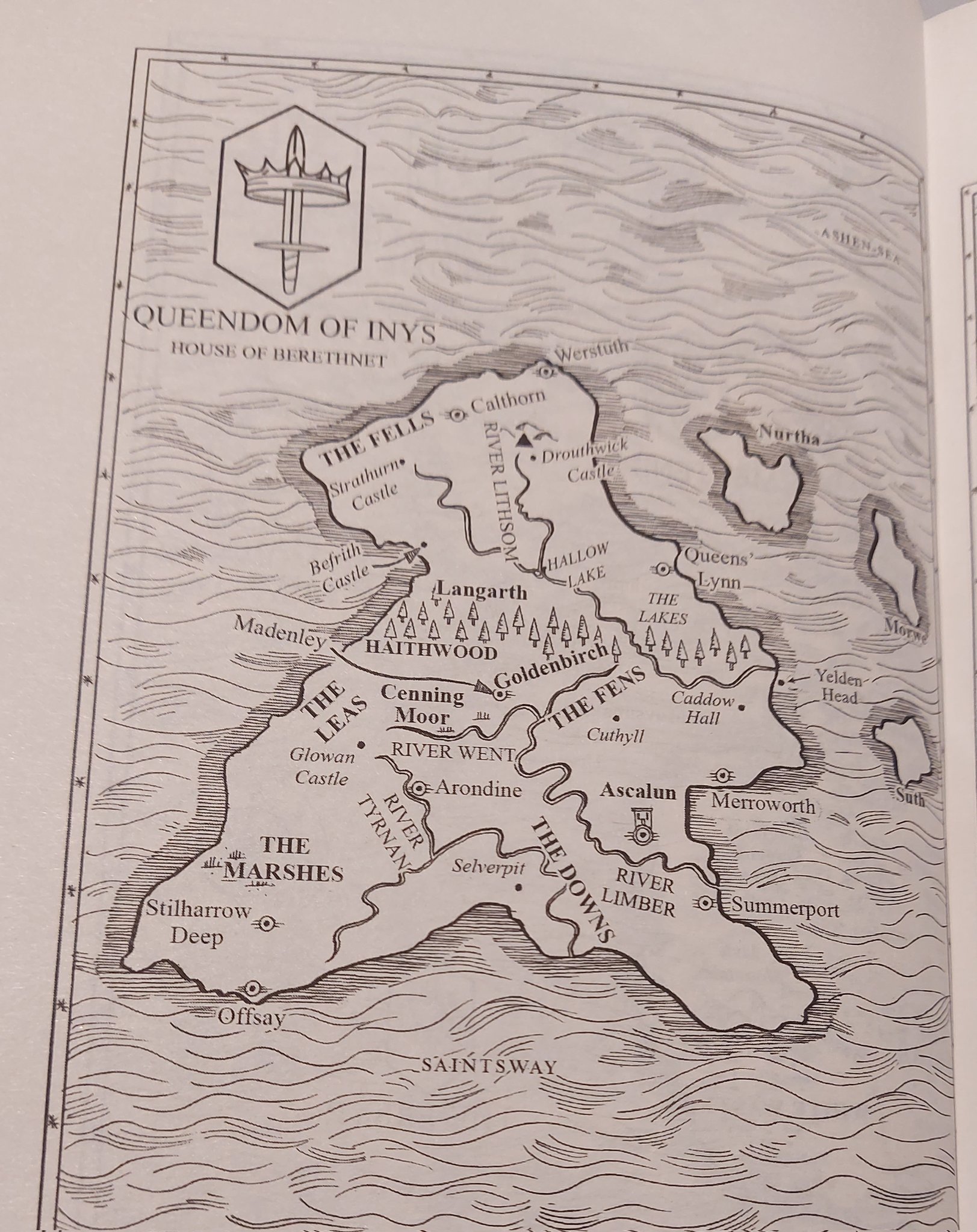 the image is a map of the queendom of inys, house of berethnet. it features various locations like calthorn, werstuth, drouthwick castle, northa, more, strathurn castle, befrith castle, madenley, langarth, haithwood, hallow lake, queens lynn, the lakes, goldenbirch, the fens, caddow hall, yelden head, cuthyll, ascalun, merroworth, suth, summerport, glowan castle, the marshes, stilharrow deep, offsay, saintsway, the fells, the leas, cenning moor, river went, arondine, selverpit, river tyrnan, the downs, river limber, and river lithsom.