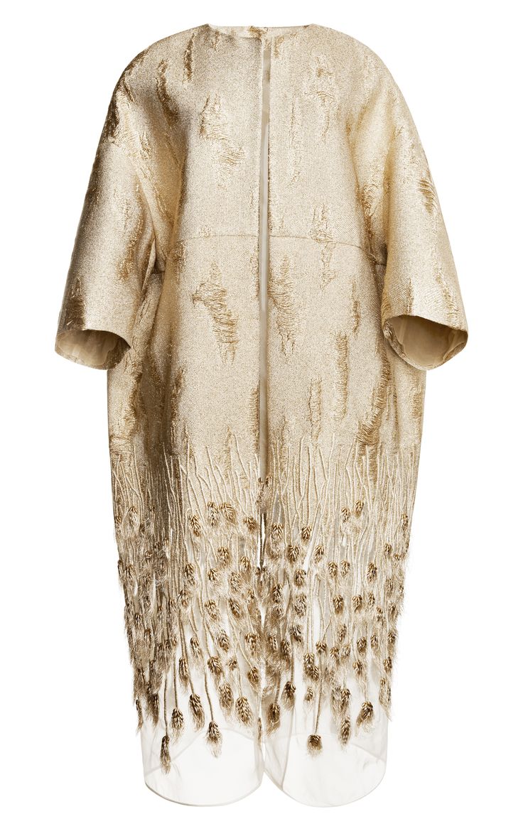 a beautiful gold long sleeved dress with a fringe bottom. it is embroidered all over with a sparkling gold pattern.  this dress is perfect for a special occasion like a wedding or gala.  the elegant cut and design are sure to make you feel glamorous.