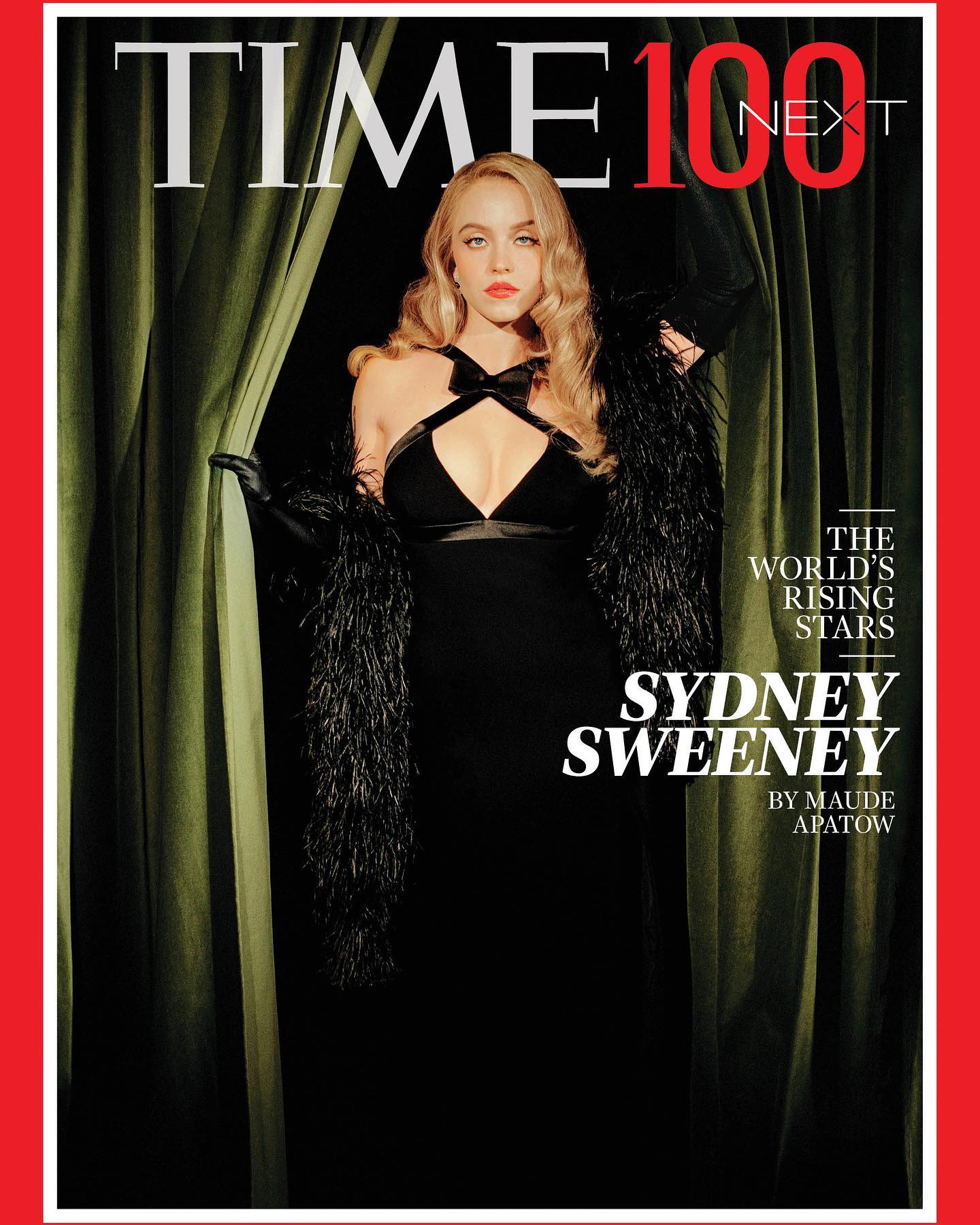 this is the cover of time magazine's "time 100 next" issue featuring actress sydney sweeney.  the image shows sweeney in a glamorous black dress with a feather boa, posed dramatically behind a pair of green velvet curtains that resemble a stage. the cover features the magazine's title and subtitle "next", sweeney's name, and a credit to maude apatow.  the overall feel is stylish and evocative of classic hollywood.