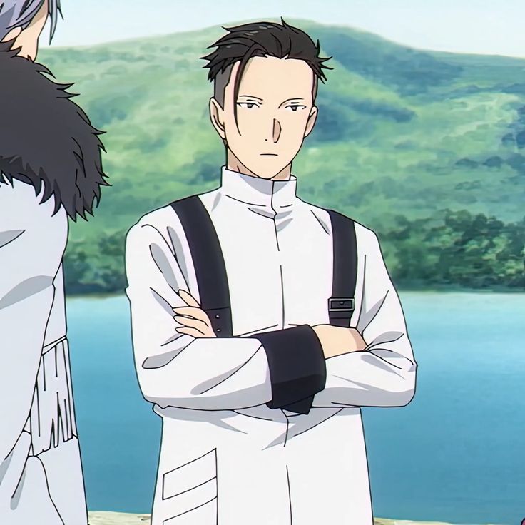 this anime image shows a male character wearing a white lab coat with black straps and a black armband. his arms are crossed. he has black hair and is standing in front of a green hill and blue water background. he looks serious with a blank expression.