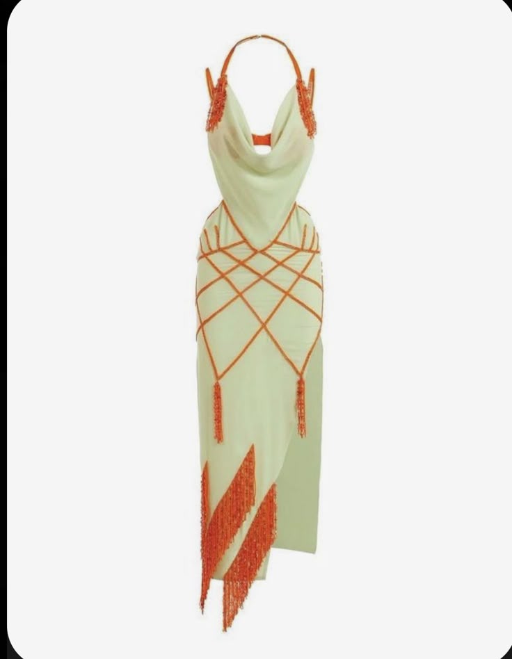 the image shows a sleeveless pale green dress with orange beaded detail. the dress features a halter neck, a cowl neck front, and a high side slit. the dress has orange beads covering the straps. the body is covered with geometric orange ribbon designs connected by small orange bead tassels. the bottom of the dress has a thick layer of orange beaded fringes. the dress is against a white background.