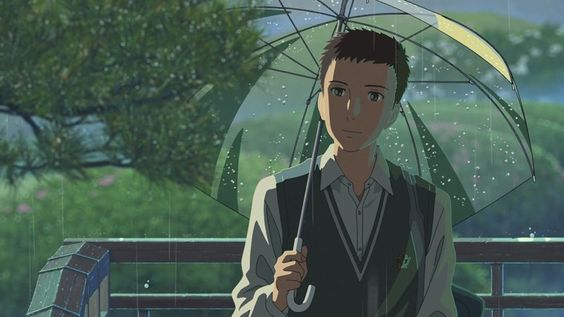 a young man sits contemplatively on a bench under a clear umbrella while rain falls around him. he is wearing a white shirt and a dark vest, and his hair is short and dark. the background is a lush green forest, and the lighting is soft and diffused, creating a sense of peace and tranquility. the overall mood of the image is one of quiet reflection.