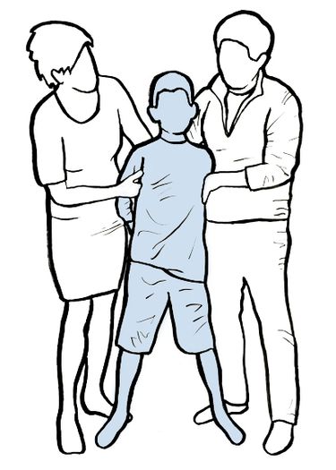 a faceless illustration of a family, consisting of a boy with his parents, with the parents standing on either side with their arms around him.