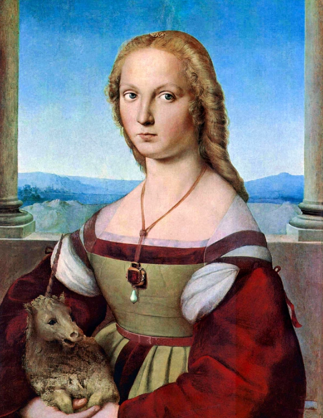 this is a portrait painting titled "lady with a unicorn" by raphael, a renaissance artist. the painting depicts a woman holding a small unicorn in her arms. she is wearing a red dress with a green bodice and a necklace with a pendant. behind her is a landscape with mountains and a blue sky, framed by columns. the overall style is characteristic of the renaissance period.