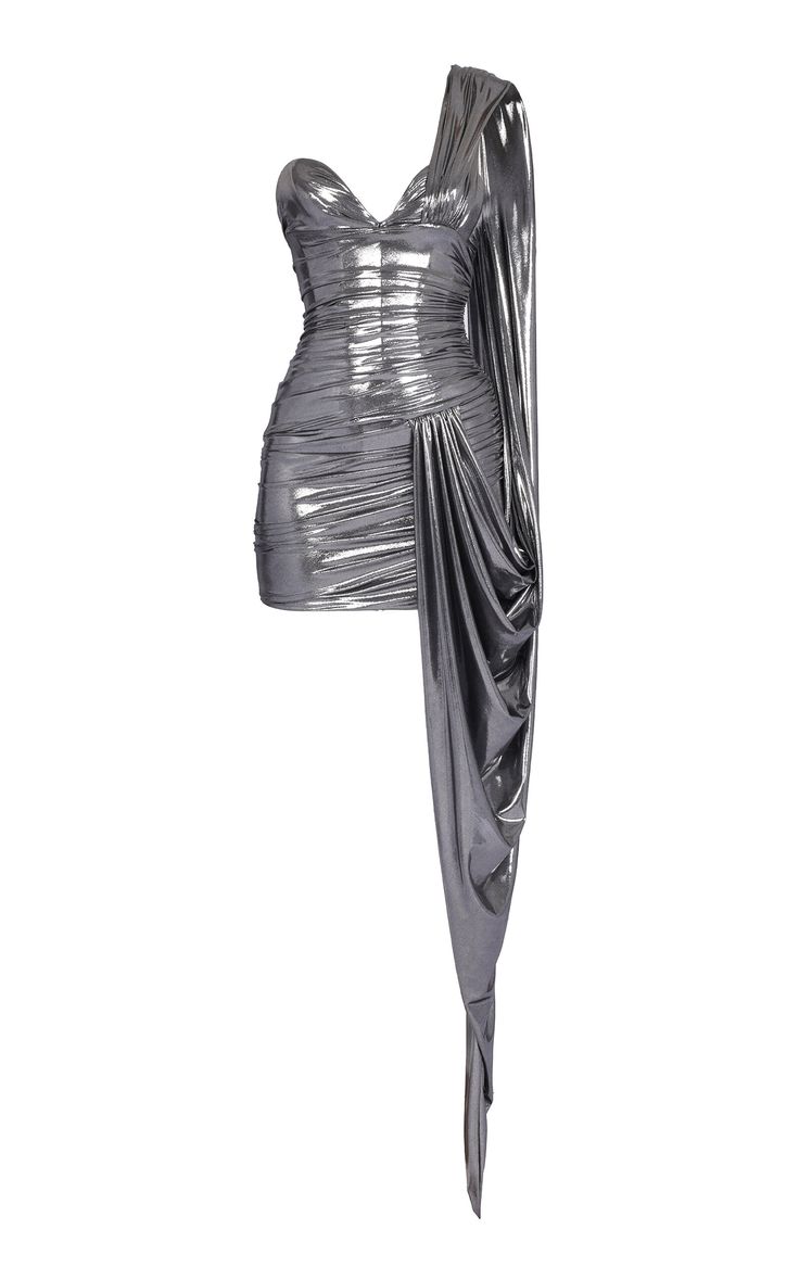 a silver, oneshoulder dress with a draped design is shown on a white background. the dress is short and formfitting with a draped element extending from the hip down.