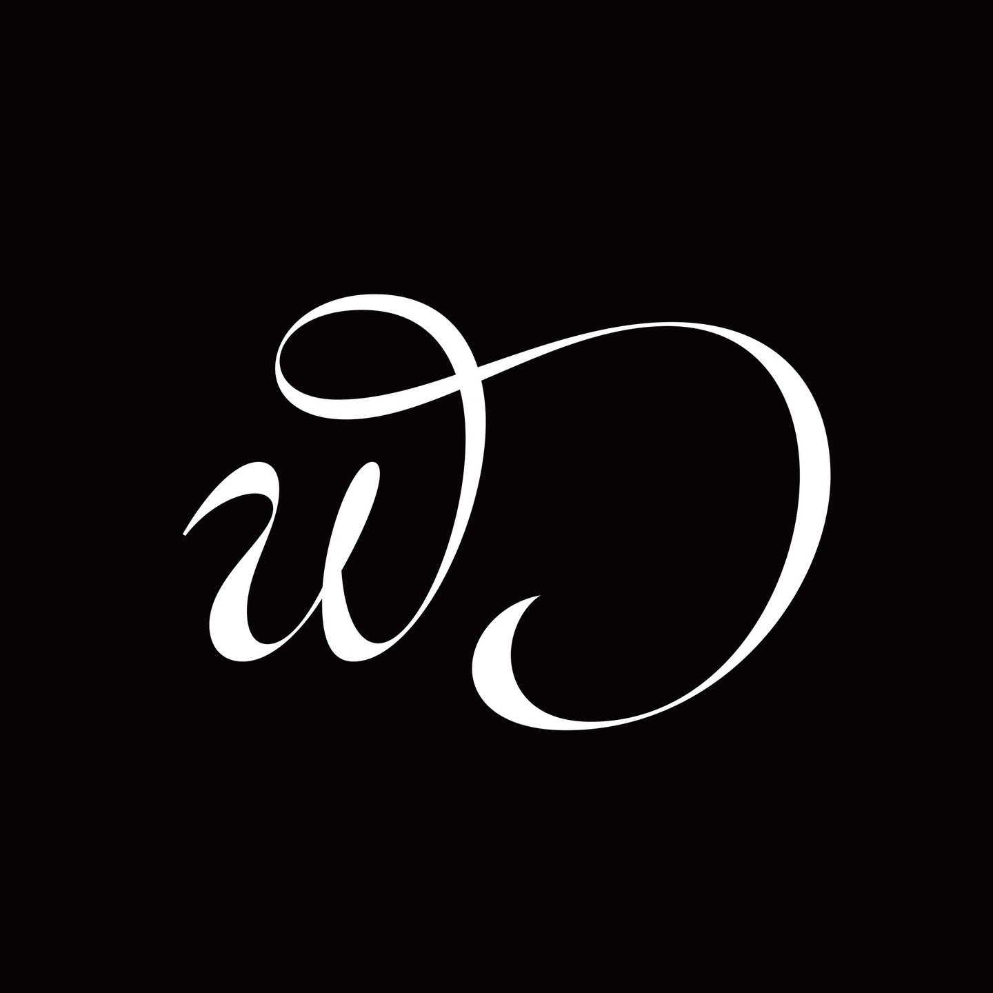 a stylized white script font of the letters "w" and "d" against a black background.