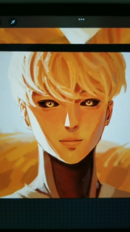 the image is a digital painting or illustration of a young animestyle male character. he has short, blond hair that is styled somewhat upwards, and his skin has a warm, golden hue. his eyes are a striking golden yellow, and his expression is calm and almost serene.  the background is blurry but seems to feature similar yellow and orange tones, creating a cohesive and warm atmosphere around the character. the style of the art is smooth and painterly, suggesting a focus on soft, blended colors and expressive lines. the overall mood is peaceful and somewhat mysterious.