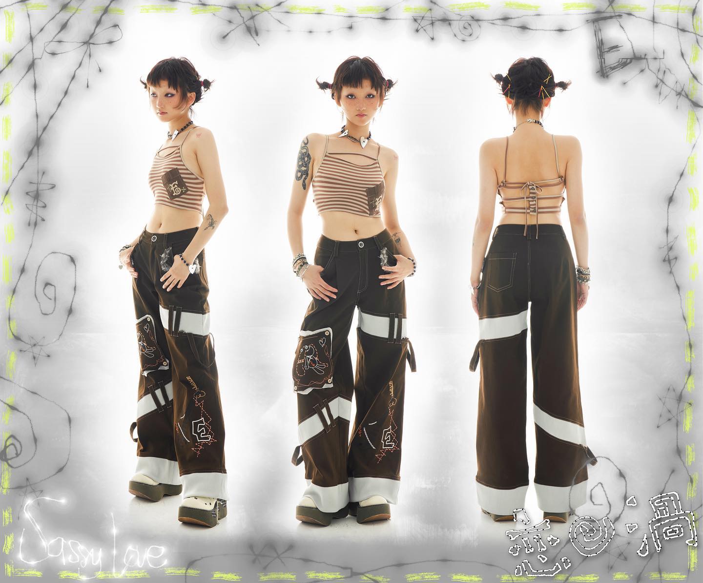 the image showcases a model wearing a stylish outfit.  the outfit includes a brown and white striped cropped tank top and a pair of unique brown cargo pants with white panels and embroidered details. the pants are widelegged and lowrise. the model is posing in three different views: front, back, and side. the background is a simple white backdrop with stylized drawings of barbed wire. the overall aesthetic is reminiscent of y2k or grunge fashion. the image is professionally shot and likely for a clothing catalog or online store.  the brand name "sassy love" is visible in the bottom left corner.