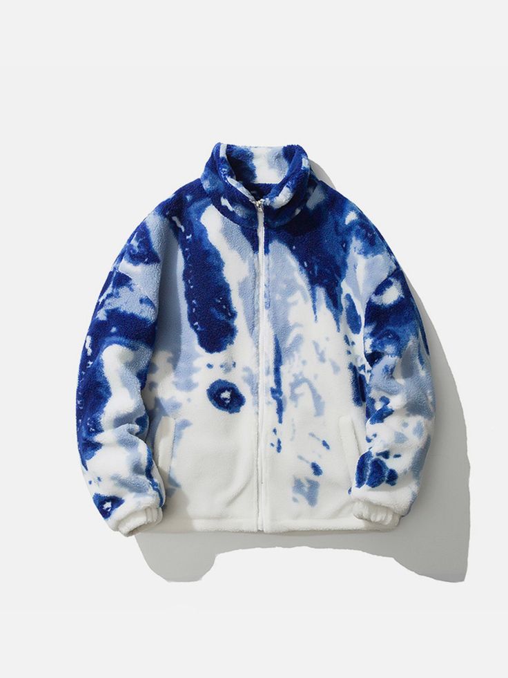 a blue and white tiedye fleece jacket with a zipper. the jacket is laid flat on a white background. it is a casual and cozy jacket that would be perfect for streetwear. it has a soft and comfortable feel to it.
