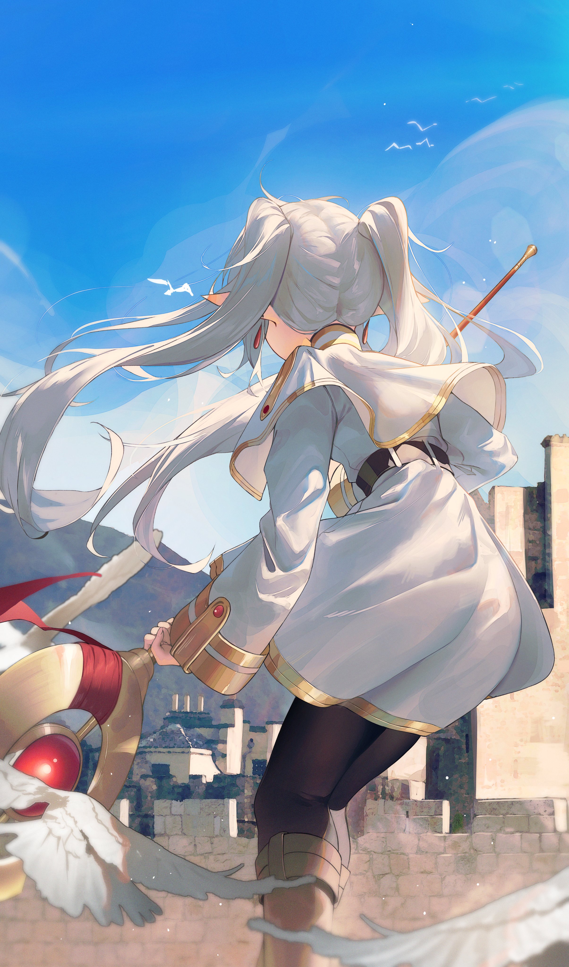 he image shows an animestyle female character with long white hair in twintails, wearing a white and gold robe and carrying a staff. she has elflike ears and is viewed from behind, walking away from the camera towards a fantasy city in the background under a bright blue sky. the style is soft and painterly, with a focus on light and atmosphere.  the overall mood is peaceful, yet suggestive of a journey or adventure.