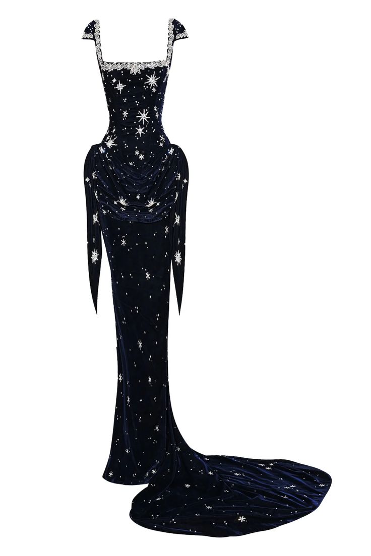a long navy blue velvet gown embroidered with stars. the dress has a square neckline, sleeveless straps, and a draped design at the hips. the gown has a long train.