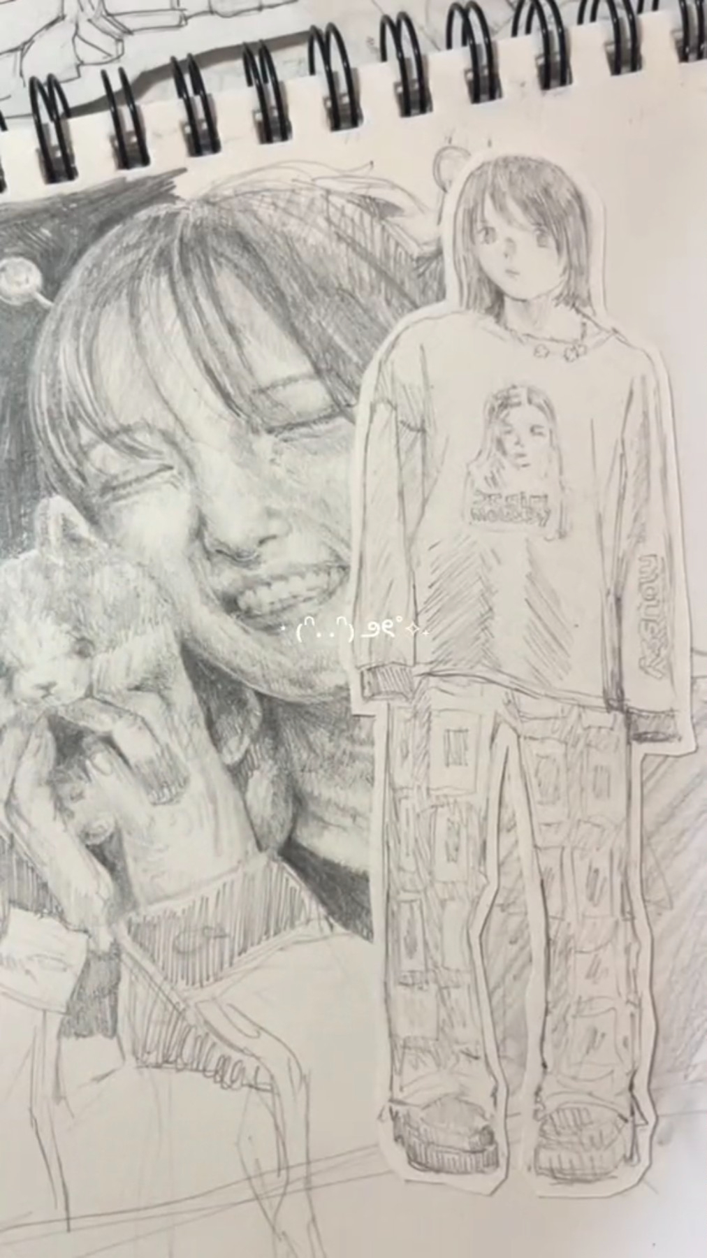 this image shows a pencil drawing of two women. the one on the left is wearing a loose shirt and has a pet sitting on her lap, while the woman on the right is wearing a patterned pair of pants and a loose, longsleeve shirt. both of the women have long hair. the drawing is on a sheet of paper, which is lined. the image looks like it was created by a student, or a young artist.