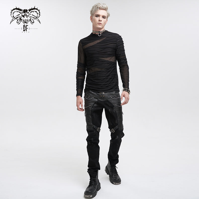a fullbody studio shot of a male model wearing a black mesh longsleeve shirt with a distressed effect, black cargo pants with buckles and studs, and black combat boots. he is accessorized with a black choker necklace. the background is plain white. the overall style is gothic, punk, and alternative.  the image is likely for an online fashion store.