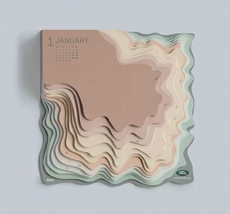a calendar with 3d, layered paper design. the top part of the calendar shows january, 2014 and the bottom part has a wavy land rover design.