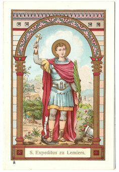 an illustration of saint expeditus framed within an ornate arch. he holds a cross in his raised hand and a palm frond in the other. he is depicted as a young man with a halo, wearing roman soldier attire. the scene is set outdoors with a landscape visible in the background. the title "s. expeditus zu lemiers" is displayed at the bottom.