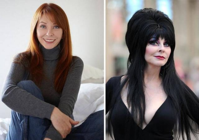 the image shows two women. one is a redheaded woman wearing a gray sweater and blue jeans. she is smiling and looking at the camera. the second woman is wearing a black dress and has black hair and black eye makeup. she is looking at the camera.