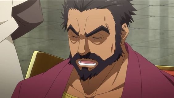 this is a closeup image of an adult male anime character. he has dark hair and a beard. he appears to be stressed, as his mouth is open and his eyebrows are furrowed. the background of the image suggests he is indoors.