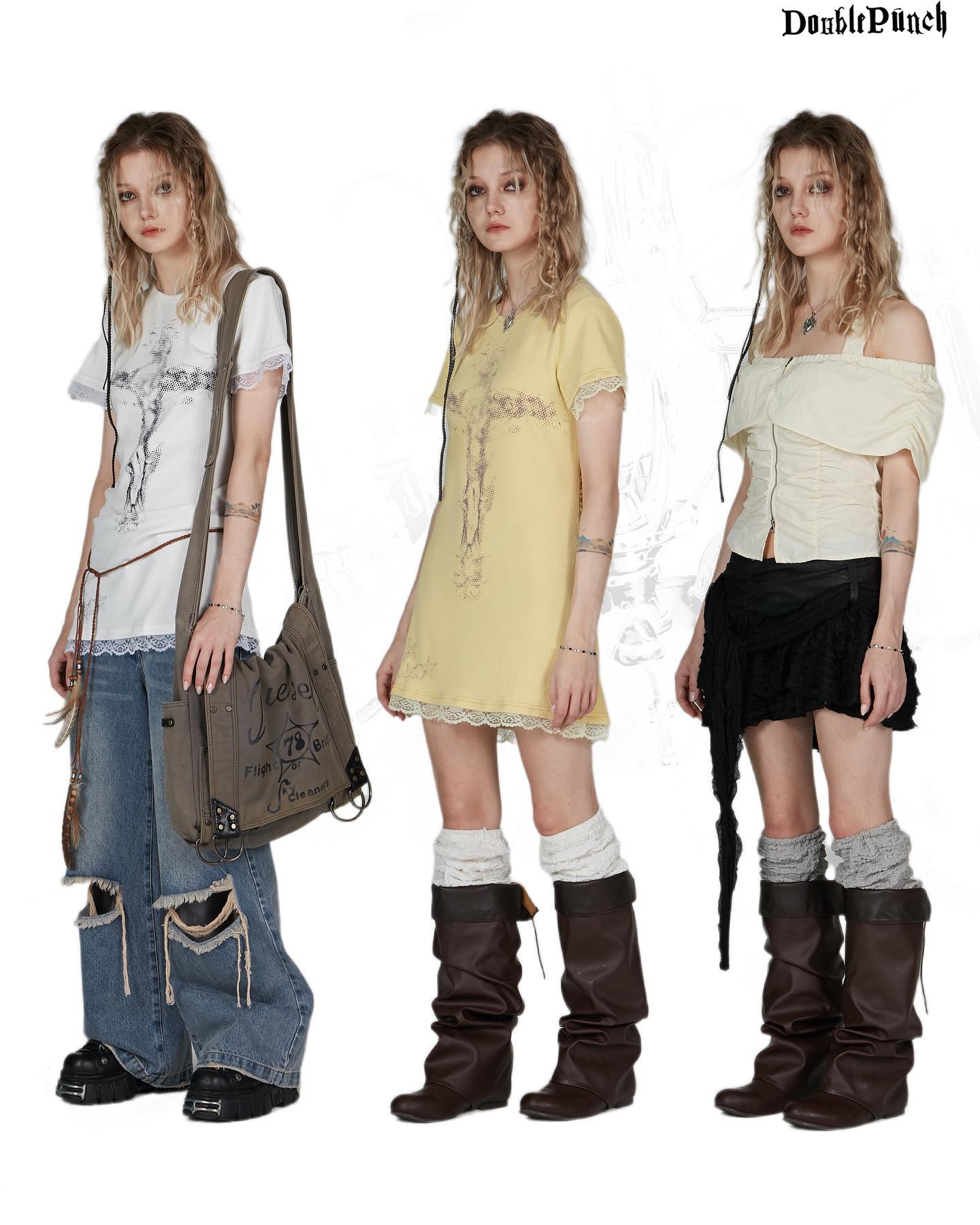the image showcases three female models, each dressed in a different outfit embodying a blend of grunge, alternative, and possibly gothic or lolitainspired styles.  the first model on the left wears a white crossprint tshirt, ripped jeans, and brown boots, carrying a large, grey tote bag. the central model is wearing a pale yellow crossprint dress, kneehigh socks, and brown slouchy boots. the model on the right sports a cream offshoulder top, a black layered skirt, and brown boots, with similar socks. each outfit features a unique combination of textures and silhouettes. the overall aesthetic is casual yet edgy. the background is plain white, focusing attention on the clothing and the models.  the image is likely promotional material for a clothing brand, indicated by the "doublepunch" watermark.