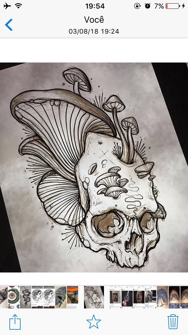 a black and white line drawing tattoo design of a skull with mushroom growing on it. the mushroom is detailed and has a swirling effect on the top. the skull looks to have a lot of detail too, especially the eye sockets. the drawing is done on a piece of paper and is done very well.
