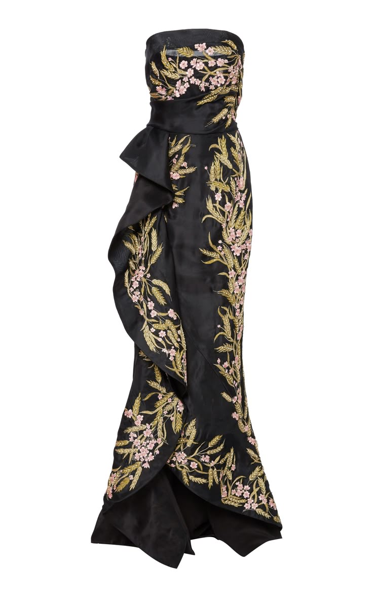 a black strapless gown with floral embroidery. the gown has a ruffled accent on the side and a sleek, elegant silhouette.