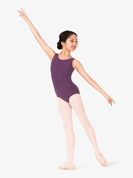 a fulllength shot of a young girl, possibly of asian descent, dressed in a purple leotard and pink tights. she is gracefully poised in a ballet pose, one arm raised, displaying excellent posture and balance. the girl appears to be in a dance studio setting against a plain white background. she is wearing ballet shoes. the image is welllit and professionally shot.