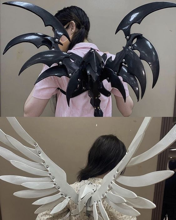 the image shows a woman modeling two different sets of large, elaborate wings designed for cosplay. the top photo features black, sharp, mechanicallooking wings reminiscent of a demon or dragon. the bottom photo showcases white, feathered wings evoking an angelic aesthetic. the woman is positioned with her back to the camera in both shots, highlighting the detailed craftsmanship of the wings.