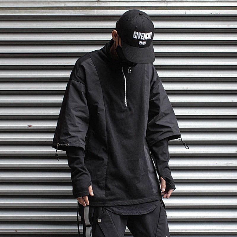 a young man in a stylish black outfit, posing against a silver metal background. he's wearing a black cap with the inscription "givenchy paris" on the front, a longsleeve black shirt with a zipper, a black jacket with long sleeves and zippers on the cuffs, and black pants. his outfit is urban and edgy, with a focus on stylish details. the background is a closeup of a metal wall, creating a minimalist and modern aesthetic.