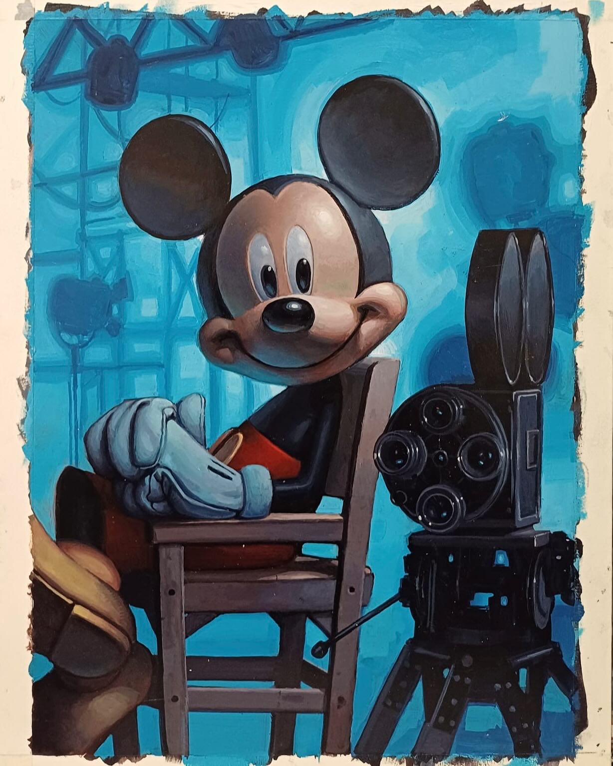 an illustration of mickey mouse sitting in a chair next to a vintage movie camera. the background is a blue studio setting with studio lights.