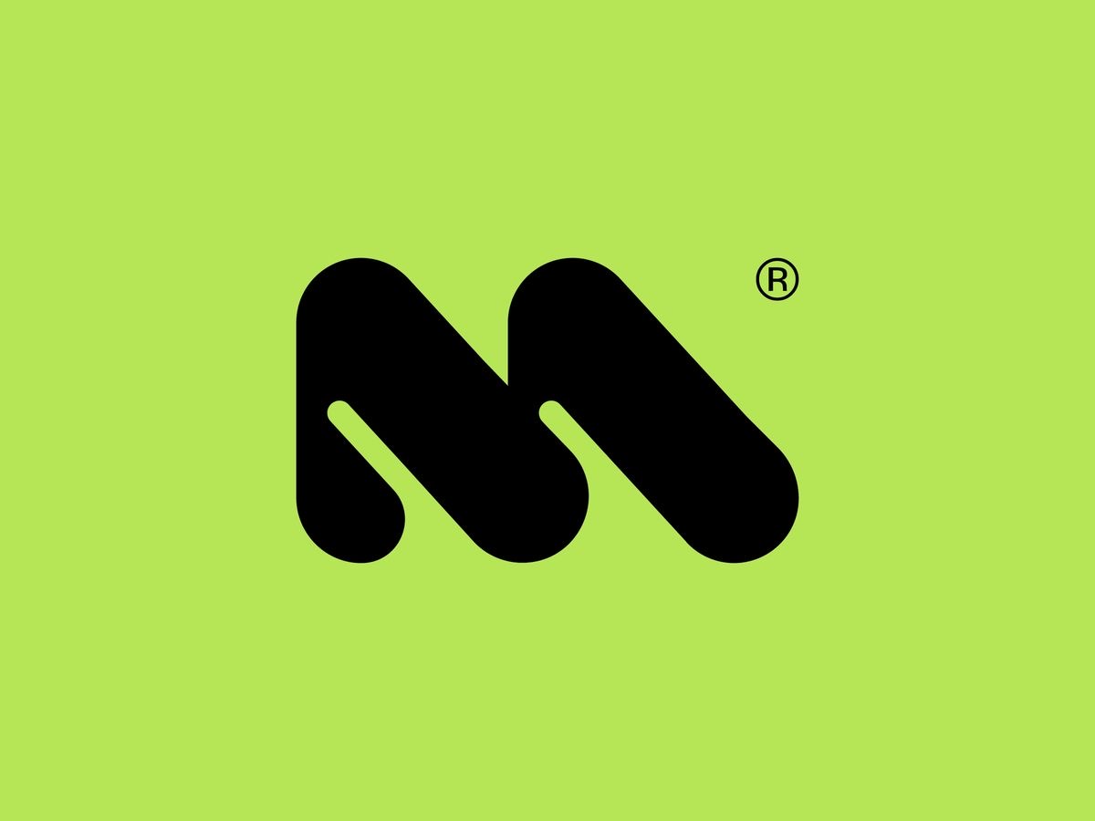 the image shows a logo design featuring a stylized letter "m" in black on a green background. the letter "m" is made up of two rounded, interlocking shapes. the logo has a modern and playful aesthetic, suggesting a brand that is creative and approachable. the "r" in a circle next to the logo indicates that the design is registered as a trademark.