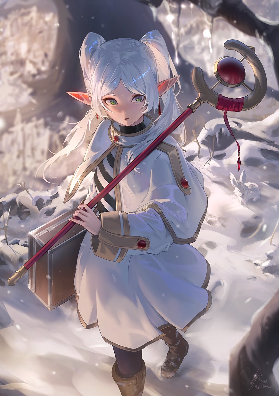 the image is a digital painting of an animestyle elf girl. she has long white hair styled in twintails, pointed elf ears, and striking green eyes. she is wearing a long, white cloak with gold and red accents over a darkstriped garment. she carries a staff with a red orb at its top and what looks like a book or tome under her arm. the background depicts a snowy, wintry landscape with rock formations and trees, creating a fantasy setting. the overall style is soft and detailed, with a focus on the character's expressive features and flowing garments. the scene suggests the girl is a mage or sorceress on a journey through a cold, magical world.
