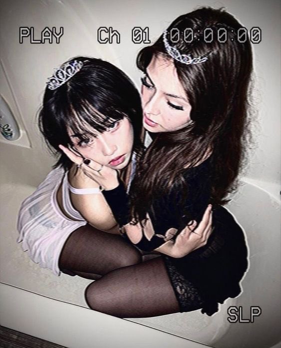 two young girls are posing