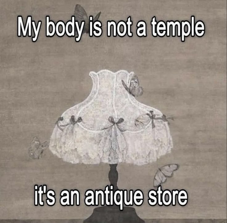 the image features an antique lamp with butterflies resting on it. there's a text overlay that reads "my body is not a temple, it's an antique store," which is a humorous meme playing on the idea of aging and the accumulation of experiences.