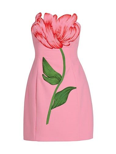 a pink, strapless mini dress with a large painted tulip design. the flower covers the bodice, with the stem extending down the front of the dress.