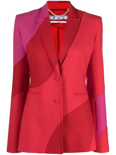 a vibrant red and pink patchwork blazer with a doublebreasted design, featuring notched lapels, flap pockets, button closures, long sleeves, a tailored cut, and a straight hem.